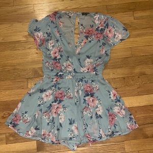 Francesca’s floral romper size medium